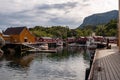 Small fishing village of Nusfjord with wooden houses in Lofoten, Norway. Royalty Free Stock Photo