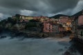 Artistic panorama of Tellaro coast at night