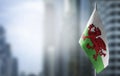 A small flag of Wales on the background of a blurred background Royalty Free Stock Photo