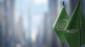 Small flags of the Arab League on an abstract blurry background