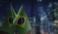 Small flags of the Brazil on an abstract blurry background Royalty Free Stock Photo