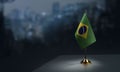 Small flags of the Brazil on an abstract blurry background Royalty Free Stock Photo