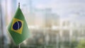 Small flags of the Brazil on an abstract blurry background Royalty Free Stock Photo