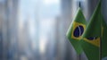 Small flags of the Brazil on an abstract blurry background Royalty Free Stock Photo