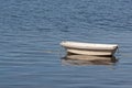 Small floating dinghy Royalty Free Stock Photo