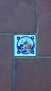 Small floor tile in Mijas one of the most beautiful `white` villages of the Southern Spain area called Andalucia.