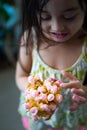 Small flower bouquet being hold by a toddler