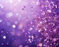 small flying shiny particles and confetti on a purple background.