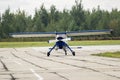 Small flying sport airplane stay on runway