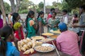 A small food and confectionery shop in a rural tribal market place in India.