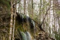 Small forest waterfall in Gorges de la Jogne river canyon in Broc, Switzerland Royalty Free Stock Photo