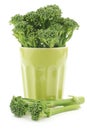 A small form of broccoli, called bimi, in a green ceramic mug Royalty Free Stock Photo