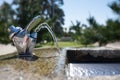 A small fountain of fresh and clean water for drinking in Georgia. Royalty Free Stock Photo