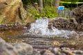 A small fountain in the sauerlandpark hemer on a spring day Royalty Free Stock Photo