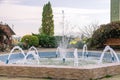 A small fountain with small jets of water Royalty Free Stock Photo