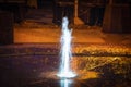 Small fountain in the spotlight Royalty Free Stock Photo