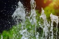 Small fountain water spashing in the park