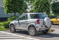 Small four wheel drive Toyota RAV 4 rear view parked