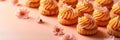 small French desserts, mini cakes, on a peach-colored background