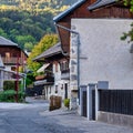 Small french houses in alpine village with mountain Royalty Free Stock Photo