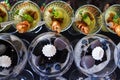 Fresh and tasty snack dishes in glasses, celebration party banquet, flat lay detail of healthy food fashion
