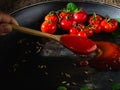 Small fresh tometo Sauce on pan. Royalty Free Stock Photo