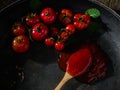 Small fresh tometo Sauce on pan. Royalty Free Stock Photo