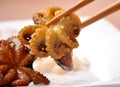 Small fried, marinated octopus. Royalty Free Stock Photo