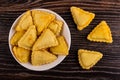 Fried savory pies in plate, pies on table. Top view