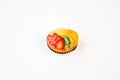 Small fruit cake on a white background Royalty Free Stock Photo