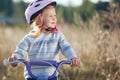 Small funny kid riding bike Royalty Free Stock Photo