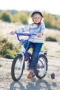 Small funny kid riding bike Royalty Free Stock Photo