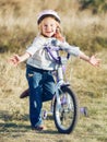 Small funny kid riding bike Royalty Free Stock Photo