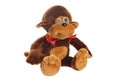 Small funny toy monkey isolated at white background. Stuffed puppet animal