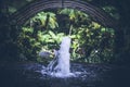 Small gaarden fountain in the park of Bali island, Indonesia. Royalty Free Stock Photo