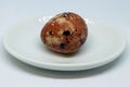 A Small Galaxy On A Quail Egg In A Red-orange Range. A Still-life On Easter Holidays.
