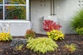 A small garden adorns the side of a modern office building Royalty Free Stock Photo