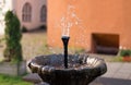 Small Garden Fountain Bronze Brown Royalty Free Stock Photo