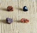 Small garden four stones (minerals) Royalty Free Stock Photo