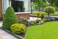 Small garden in front of the Dutch house. Royalty Free Stock Photo