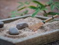 Small Garden With Rocks and Broom. Generative AI