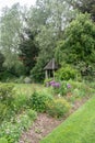 Small garden shelter in background of English Garden