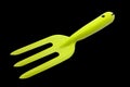 Small gardening , green fork isolated