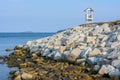 Small gazebo located on the rocks by the sea