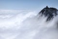 A small gazebo on the top of the majestic cliff of Emai Mountains in Sichuan province in China.