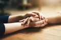 Small gestures of kindness go a long way. Closeup shot of two unidentifiable people holding hands in comfort. Royalty Free Stock Photo