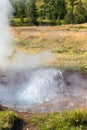 Small geyser in Haukadalur valley in Iceland