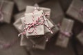 Small gift box on top of a pile of gift boxes.