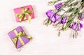 Small gift boxes and flowers. Gift on a white background. Copy space Royalty Free Stock Photo