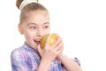 Small girl with an apple Royalty Free Stock Photo